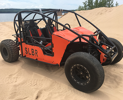 a tractor on a beach