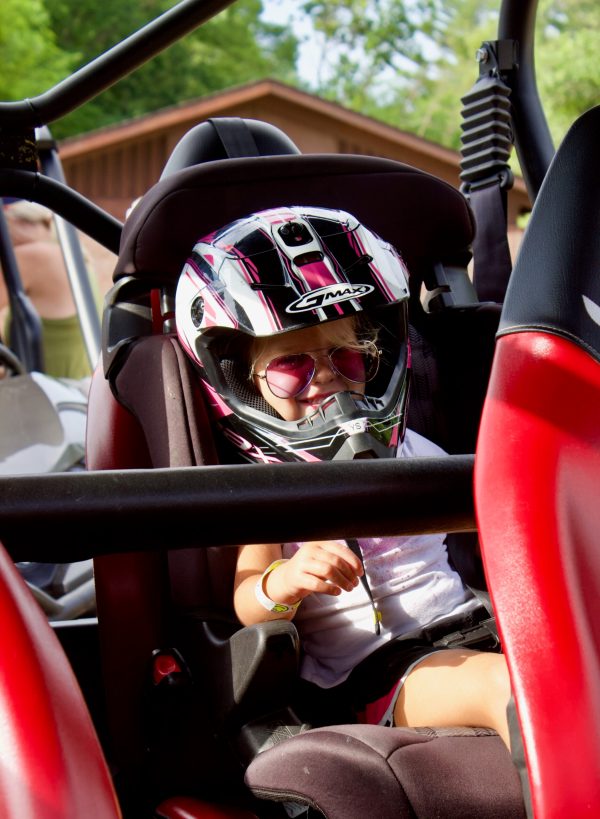 a person sitting on a motorcycle
