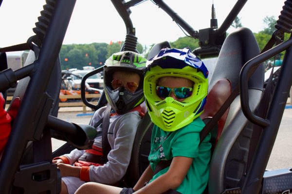 a person sitting on a motorcycle