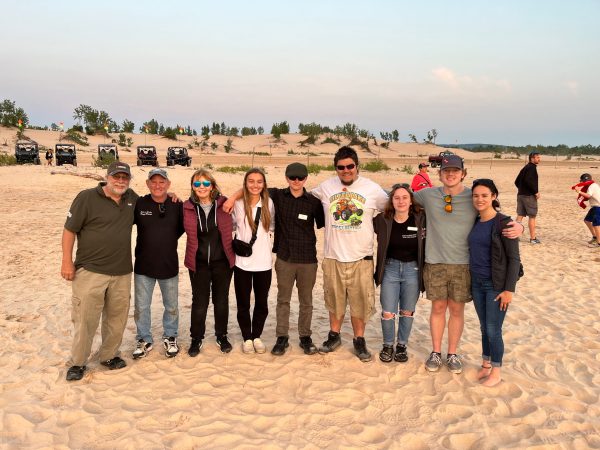 a group of people posing for a photo